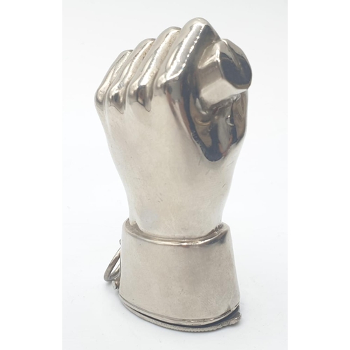 125 - White metal VESTA CASE in the form of a hand.