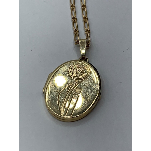 62 - 9CT YELLOW GOLD OVAL LOCKET AND CHAIN