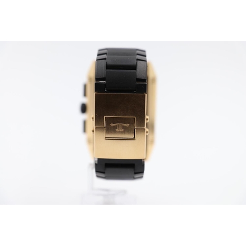 35 - Jaeger le Coultre rose gold Watch, square face reverse skeleton back and black rubber strap, SERIAL ... 