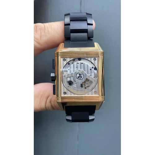 35 - Jaeger le Coultre rose gold Watch, square face reverse skeleton back and black rubber strap, SERIAL ... 