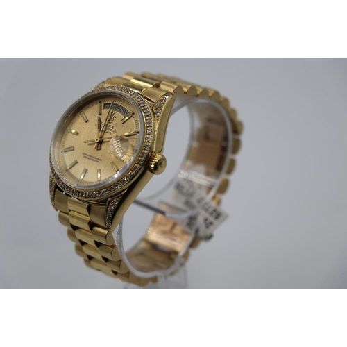 76 - Rolex Daydate watch 1970s model with custom diamond shoulders and bezel, factory dial, come with box... 