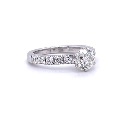 356 - 18ct white gold ring, with 1.01ct centre diamond (G/sI2) and further 0.5ct diamond on shoulder (G/h,... 