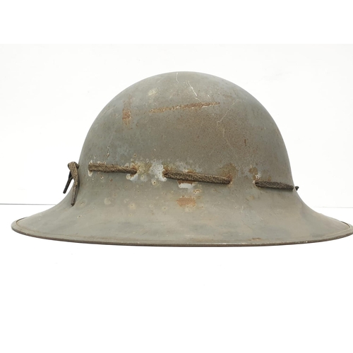 117 - WW2 Zuckerman Helmet. Marked with the Allen West Factory Logo. This company made Mills grenades duri... 