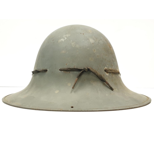 117 - WW2 Zuckerman Helmet. Marked with the Allen West Factory Logo. This company made Mills grenades duri... 