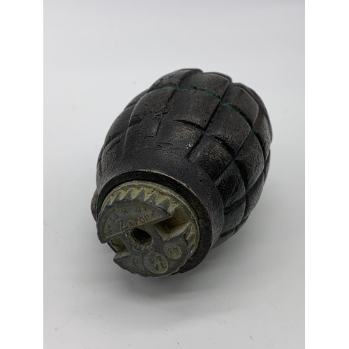 74 - INERT WW2 No 36 Mills Grenade. Base is dated 1943. Made by E.F South Africa.