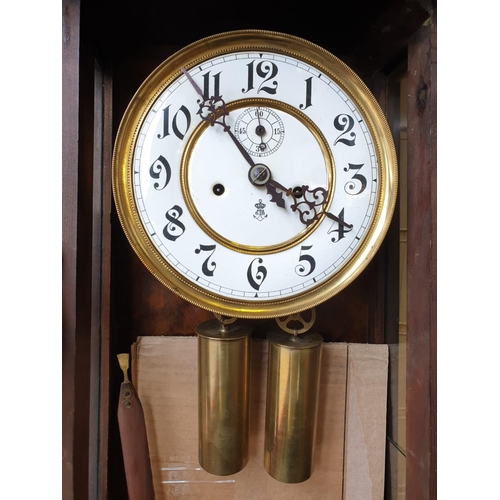 821 - Vintage wall hanging hall clock with pendulum H95 x W42cm approx