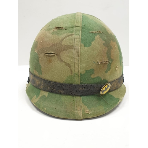 90 - Vietnam War Era US M1 Helmet with fibre liner and “Mitchel” Reversible Camouflage Cover.