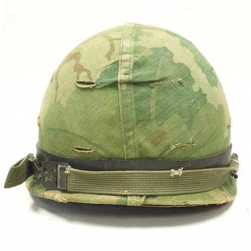 90 - Vietnam War Era US M1 Helmet with fibre liner and “Mitchel” Reversible Camouflage Cover.