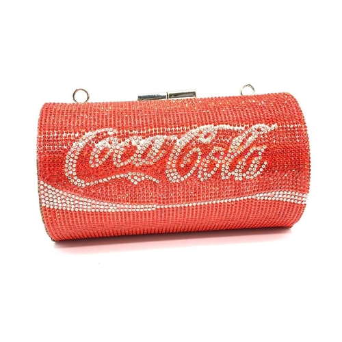 98 - A funky, evening bag designed in the style of a COCA COLA tin, totally
covered with Swarovski crysta... 