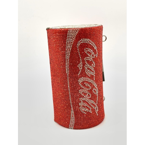 98 - A funky, evening bag designed in the style of a COCA COLA tin, totally
covered with Swarovski crysta... 