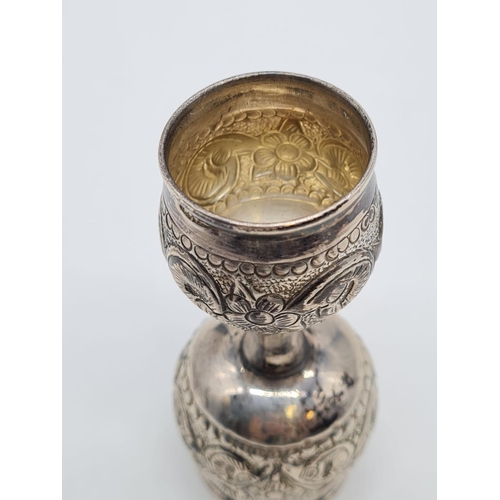 46 - Unusual White Metal Double Goblet. Both Goblet are having Floral Design. Weight: 48.4g. Height:10cm