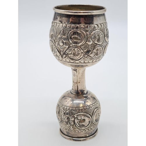 46 - Unusual White Metal Double Goblet. Both Goblet are having Floral Design. Weight: 48.4g. Height:10cm