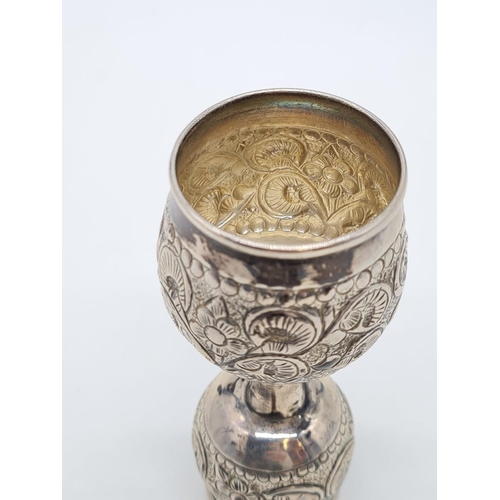 46 - Unusual White Metal Double Goblet. Both Goblet are having Floral Design. Weight: 48.4g. Height:10cm