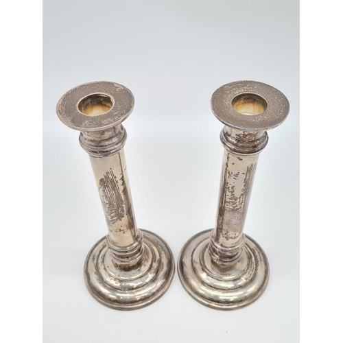 52 - A Pair of Column Candle Stick. 925 Sliver. Weight:1.25kg. 20cm Height. 9cm Diameter at Base.