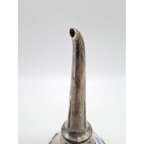 64 - Antique White Metal Wine Strainer Weight: 136.5g.
Height: 16cm