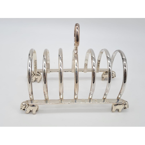 68 - White Metal Toast Rack with Elephant Feet Stand. 
Weight: 267g. Length:16cm