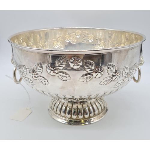 76 - Silver on Copper Punch Bowl with Lion Head Handle. Floral design. 26cm Diameter, 17cm Height. 1.45kg