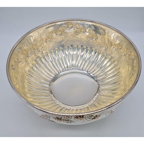 76 - Silver on Copper Punch Bowl with Lion Head Handle. Floral design. 26cm Diameter, 17cm Height. 1.45kg