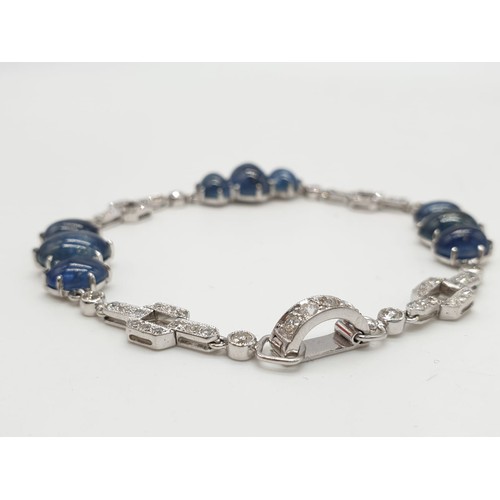 12 - Sapphire and diamond bracelet set in 18ct white gold, weight 15.53g and 19.5cm long approx.
Bigger s... 