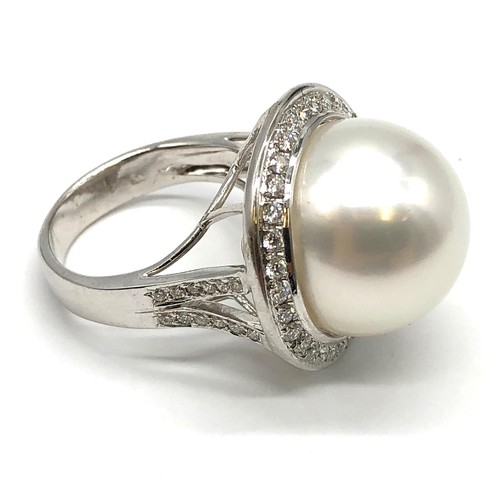 24 - A large Kimoto pearl (17mm diameter) ring set in diamond and 18ct white gold ring, weight 14.43g and... 