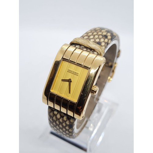 36 - 18ct gold ladies Boucheron watch, tank style with gold face and original Boucheron snake skin strap ... 