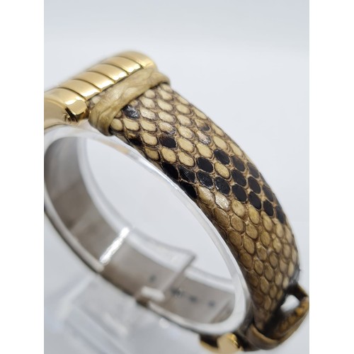 36 - 18ct gold ladies Boucheron watch, tank style with gold face and original Boucheron snake skin strap ... 