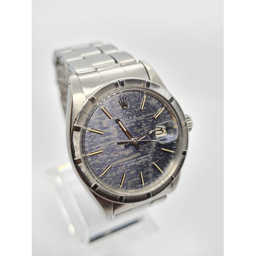 39 - Rolex Oyster Perpetual Date 1965 with rare dials, 36mm case and steel strap, comes with original pap... 