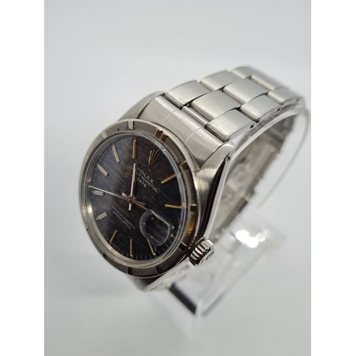 39 - Rolex Oyster Perpetual Date 1965 with rare dials, 36mm case and steel strap, comes with original pap... 