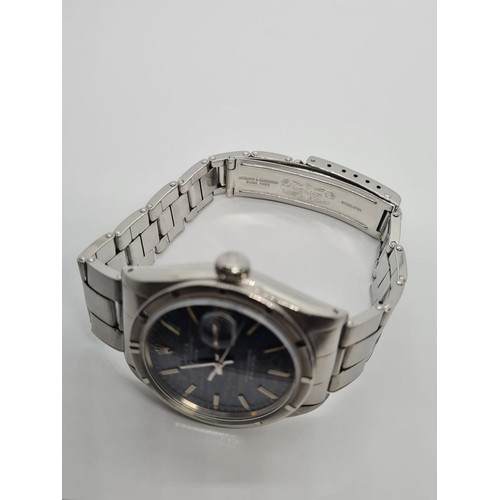 39 - Rolex Oyster Perpetual Date 1965 with rare dials, 36mm case and steel strap, comes with original pap... 