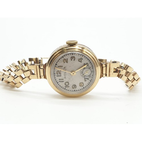 43 - 18ct gold Tudor vintage ladies watch, diamonds on each side of face, comes with safety chain and wor... 