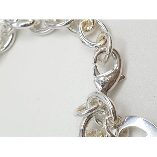 57 - Silver Necklace and Bracelet Marked as Tiffany, 73.2g Necklace 40cms, Bracelet 16cms.