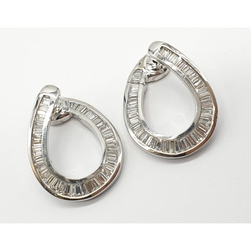 66 - Pair of large 18ct white gold and baguette cut diamond horse shoe earrings, weight 13.45g and 2.5cm ... 