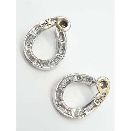 66 - Pair of large 18ct white gold and baguette cut diamond horse shoe earrings, weight 13.45g and 2.5cm ... 