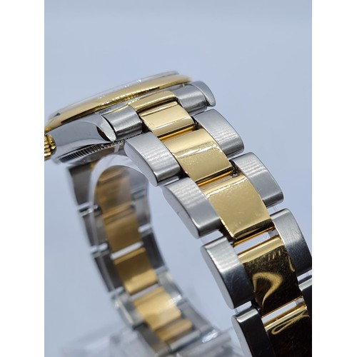 73 - Rolex Oyster Perpetual chronometer ladies watch with silver face and gold bezel,26mm case two tone s... 