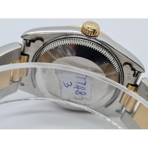 73 - Rolex Oyster Perpetual chronometer ladies watch with silver face and gold bezel,26mm case two tone s... 