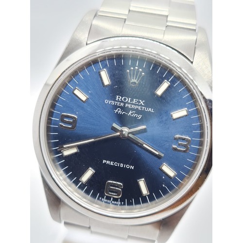 143 - Rolex Oyster Perpetual Air-King Precision gent watch with blue face steel strap, 36mm case