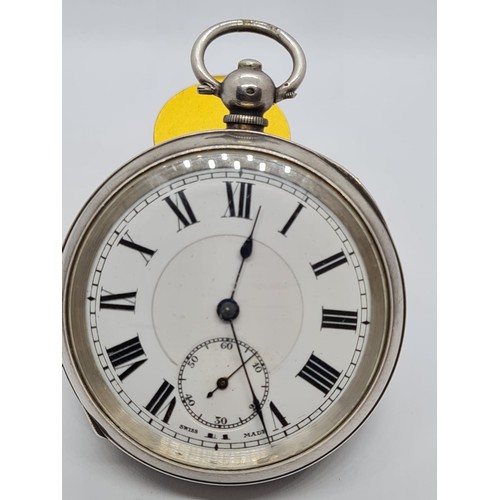 145 - Silver pocket watch with rear key wind with Roman Numerals on unmarked face, Full working order earl... 