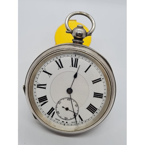 145 - Silver pocket watch with rear key wind with Roman Numerals on unmarked face, Full working order earl... 