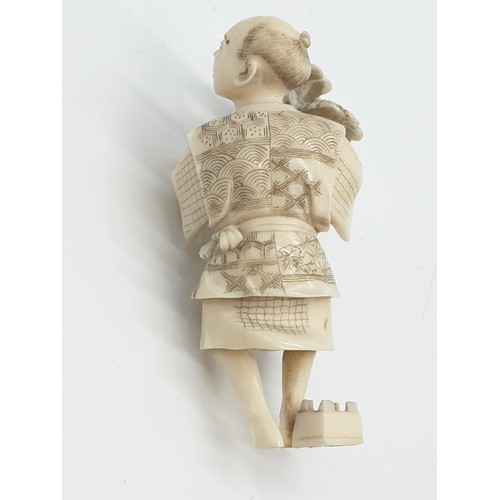 169 - 19th century ivory Japanese Meiji Period Okimono gardener figure, 26.7g weight and 6.5cm tall, one f... 