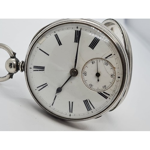 170 - An 1871 silver pocket watch , rear wind and second hand, Roman Numerals, Full working order