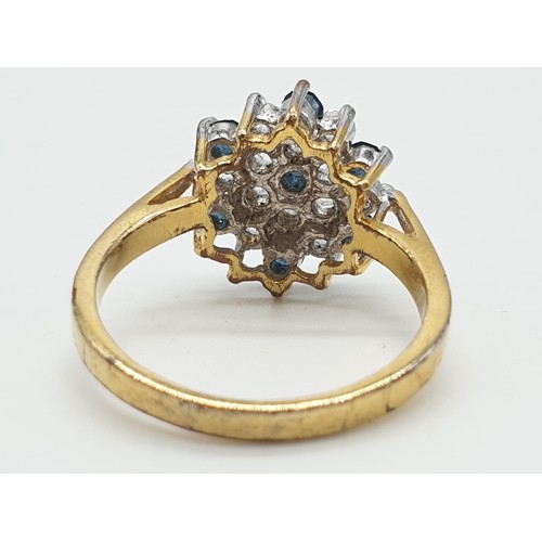 231 - 18ct gold stone set cluster ring, weight 3.5g and size S