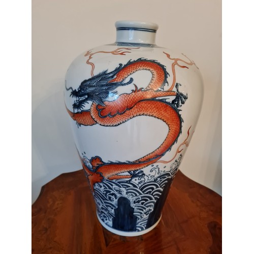 253 - Large Chinese Vase dragon decorated. 
H40 w25