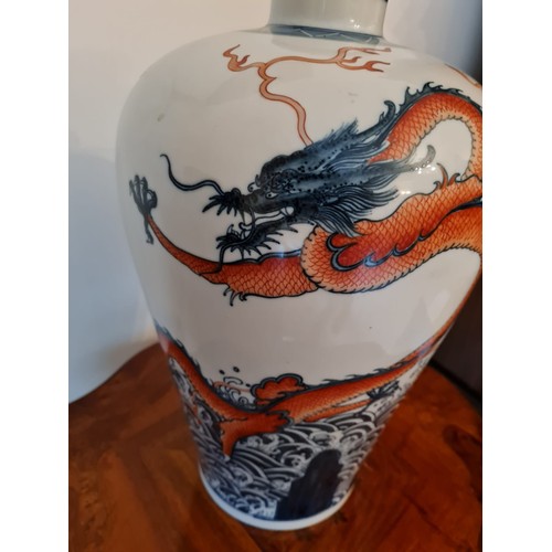 253 - Large Chinese Vase dragon decorated. 
H40 w25