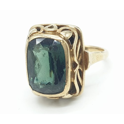 286 - Yellow metal (tested 14ct) ring with large tourmaline centre stone, size Q weight 5.9g