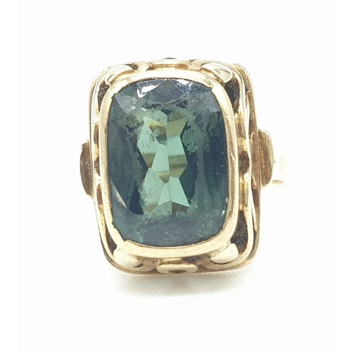 286 - Yellow metal (tested 14ct) ring with large tourmaline centre stone, size Q weight 5.9g