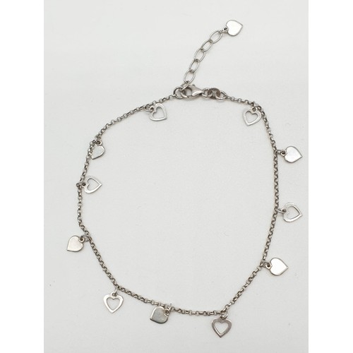 320 - Silver heart bracelet with extension links, 23cm long and 4.2g approx