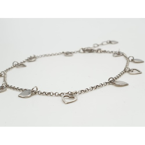 320 - Silver heart bracelet with extension links, 23cm long and 4.2g approx