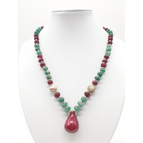 336 - Stone set (ruby and emerald?) necklace, weight 44.62g and 46cm long approx