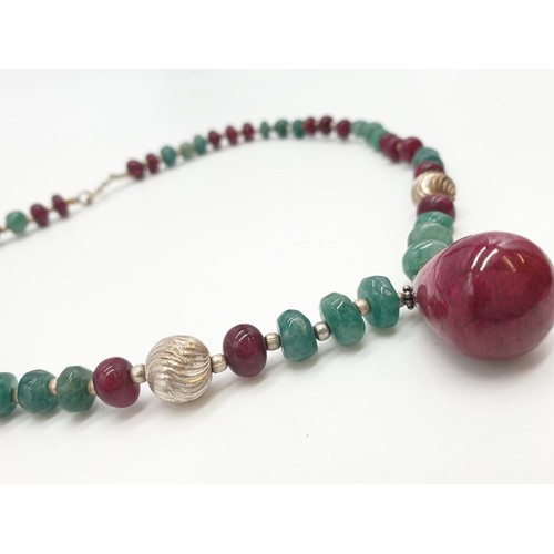 336 - Stone set (ruby and emerald?) necklace, weight 44.62g and 46cm long approx