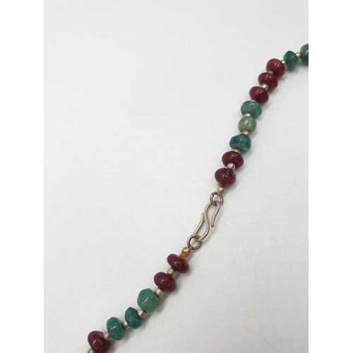 336 - Stone set (ruby and emerald?) necklace, weight 44.62g and 46cm long approx